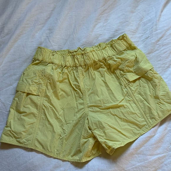 FREE PEOPLE MOVEMENT YELLOW CARGO SHORTS - Picture 1 of 3